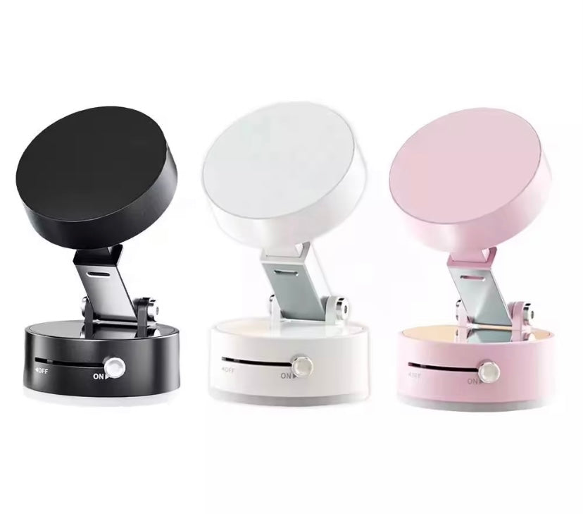 Magnetic suction phone holder